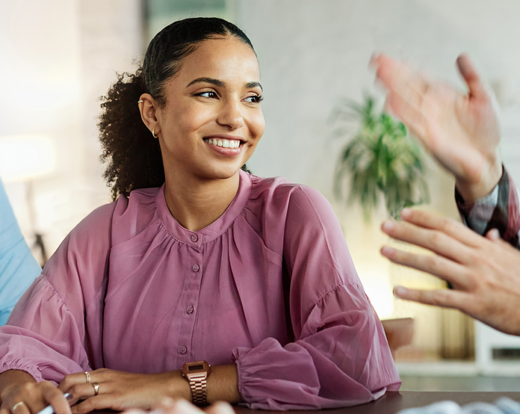 Legal Declaration Services. Woman smiling while talking to someone