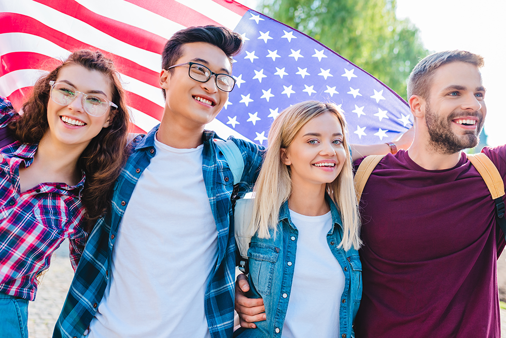 Group of young people with an American Flag